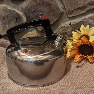 Vintage metal whistling teapot